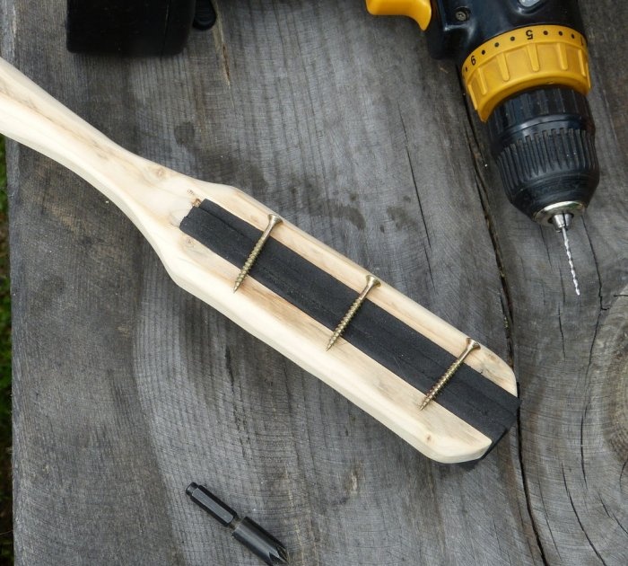 A homemade brush made from recycled materials that doesn't allow debris to stick to it.