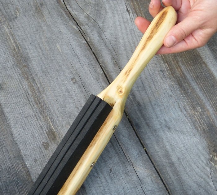 A homemade brush made from recycled materials that doesn't allow debris to stick to it.