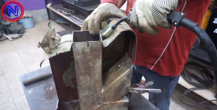 Estufa milagrosa portátil de bricolaje hecha de un bote viejo