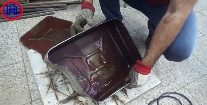 Estufa milagrosa portátil de bricolaje hecha de un bote viejo