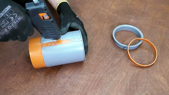 DIY case for a watering hose from an old canister