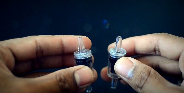 Hoe maak je een vacuümsealer van een injectiespuit?