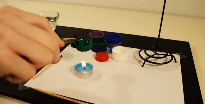 Hoe maak je een dispenser van een plastic flesdop en gebruiksdozen