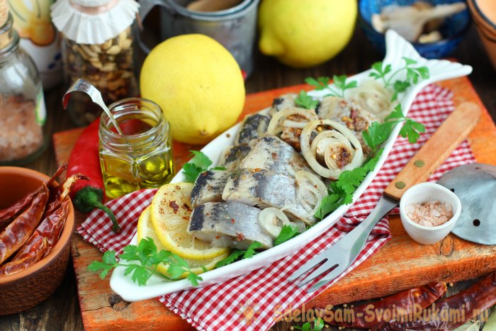 Herring marinated in a jar with spices and lemon