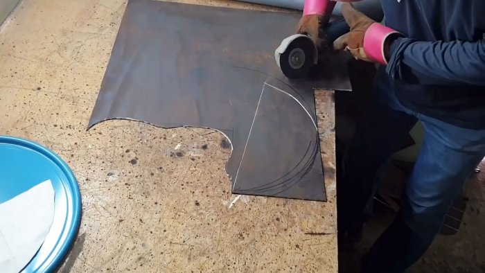 Как да направите фурна с горно зареждане от метален резервоар