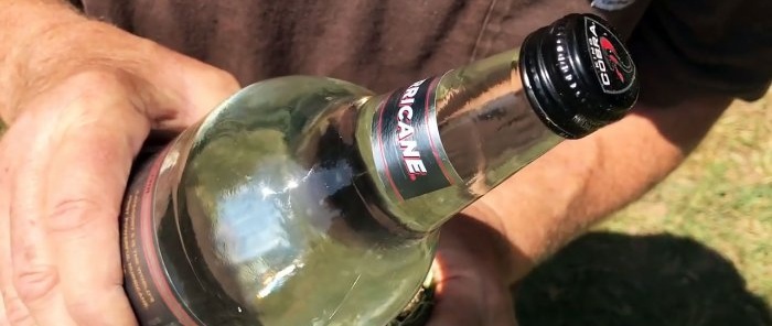 Hvordan starte et bål med en flaske