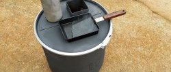 How to make a top-loading oven from a metal tank