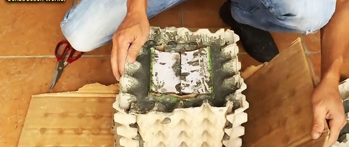 Çimento ve yumurta tepsilerinden yapılmış saksı