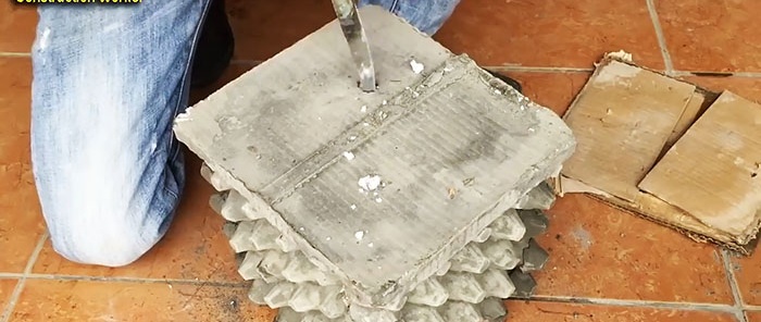 Květináč vyrobený z cementu a podnosů na vejce