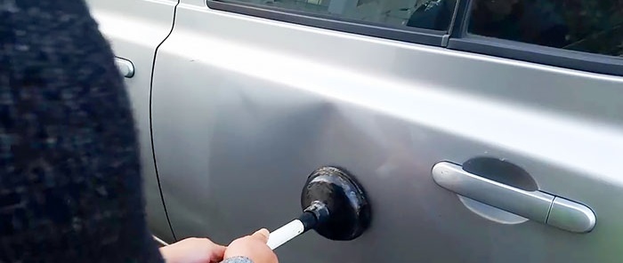 Removing dents with a plunger