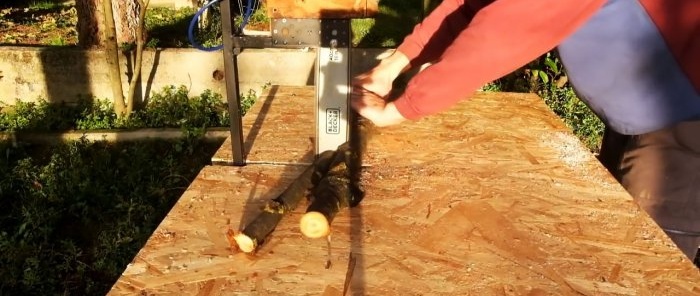 Cum se face o mașină pentru tăierea lemnului de foc dintr-un ferăstrău electric cu lanț