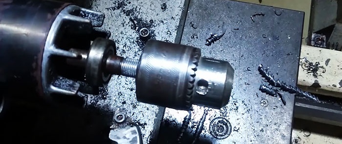 How to remove a press-on pulley from an electric motor and install a drill chuck