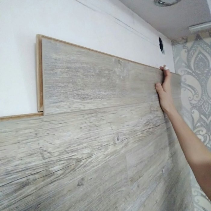 Colocar laminado en la pared.