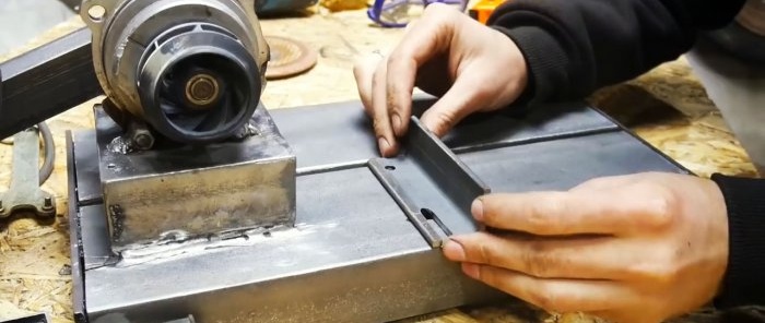 Hvordan lage et utmerket stativ for en vinkelsliper fra en gammel bilpumpe