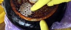 We easily remove many years of carbon deposits from a frying pan.