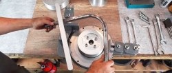 How to make a pipe bender from a car flywheel and a Bendix starter