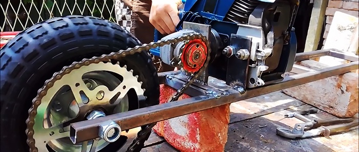 Scooter with a chainsaw engine and an angle grinder gearbox
