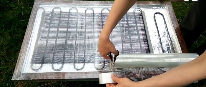 Hvordan lage en solfanger for oppvarming av vann i et landsted