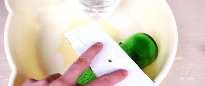 How to pierce a glass bottle with a nail