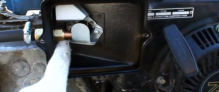 Sådan konverteres en benzin-gå-bag-traktor til gas