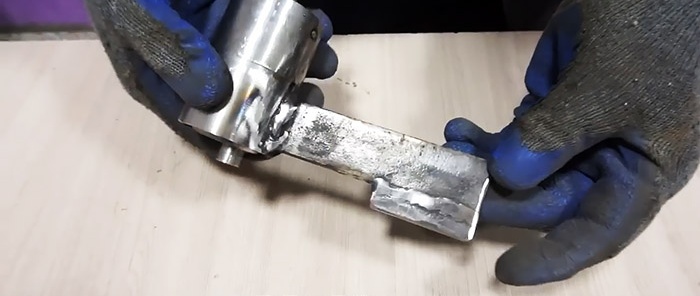 Snabb metallsax som drivs av en elektrisk borr