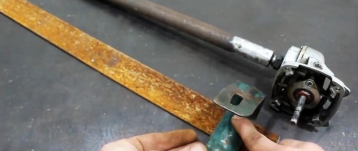 كيفية صنع جهاز لف الينابيع من علبة تروس المطحنة