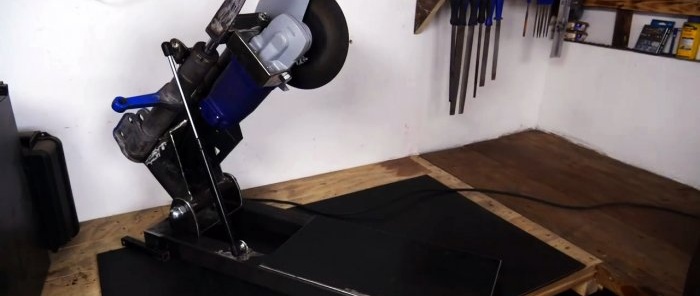 How to make a cutting machine from an angle grinder and old shock absorbers