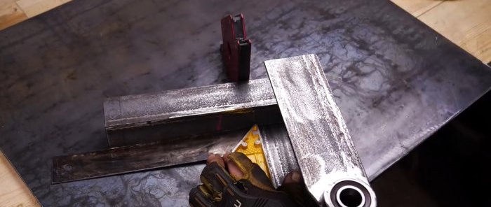 How to make a cutting machine from an angle grinder and old shock absorbers