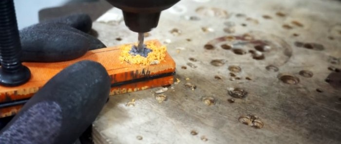 Hvordan lage en sammenleggbar lommekniv av ødelagt saks