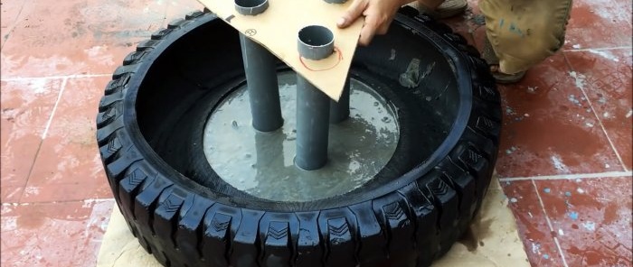 Come realizzare una fontana da giardino a tre livelli con vecchi pneumatici
