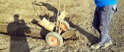 How to quickly plant a lot of potatoes using a homemade hiller plow