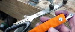 How to make a folding pocket knife from broken scissors