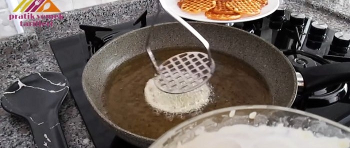 Super Reisig, zubereitet mit einem Kartoffelstampfer