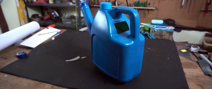 How to make a garden watering can from a canister and cutting a pipe