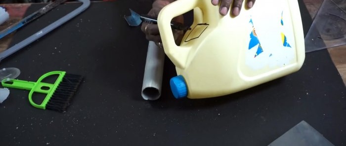 How to make a garden watering can from a canister and cutting a pipe