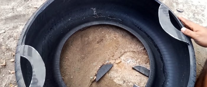 Hvordan lage en vanntank av et gammelt dekk