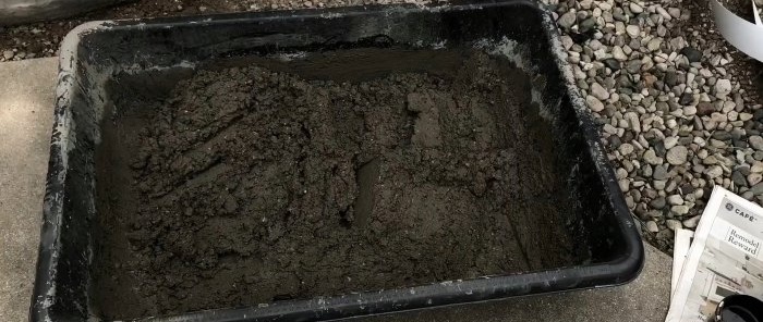 Hur man gör imiterade platta kullerstenar av cement
