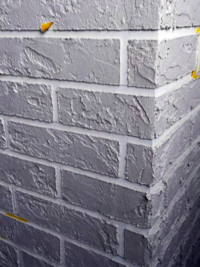 Do-it-yourself simpleng pampalamuti brick plaster