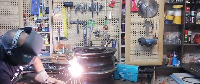 How to make a portable stove for a cauldron from wheel rims