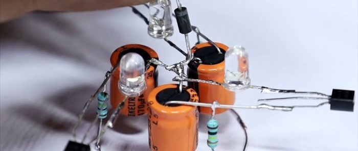 Kā salikt trīs LED zibspuldzi, ko darbina 220 V