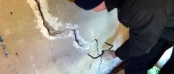 How to Repair an Expanding Crack in a Wall to Stop It Reappearing