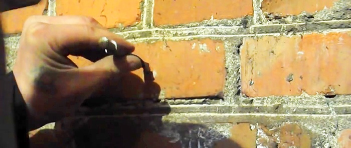 An old-fashioned way to make a hole without a hammer drill