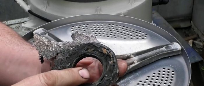 Com restaurar l'eix sota el segell d'oli d'una rentadora