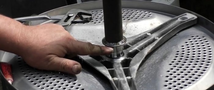 כיצד לשחזר את הפיר מתחת לאטם השמן של מכונת כביסה