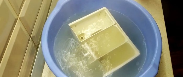 Hoe maak je een wasmachinebak schoon met de meest hardnekkige aanslag als niets deze verwijdert