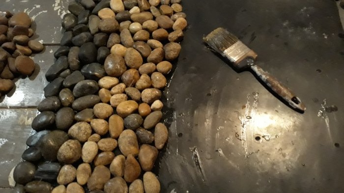 Cum să faci un covor original din pietre de râu