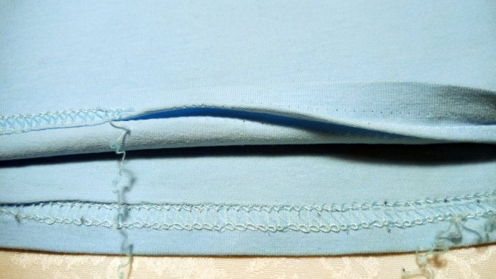 Reparasjon kan ikke kastes eller hvordan du fikser en ujevn fald i en strikket T-skjorte