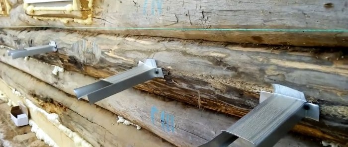 How to make a reliable hanger for covering a log house with siding