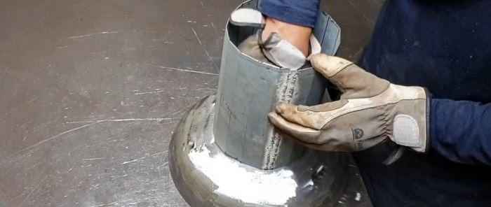 Come realizzare una griglia da una bombola di gas per una bricchetta di carburante