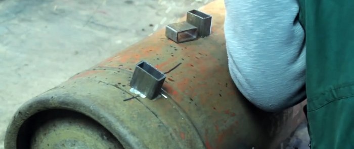 Hoe maak je een eenvoudige garagekachel van een gasfles